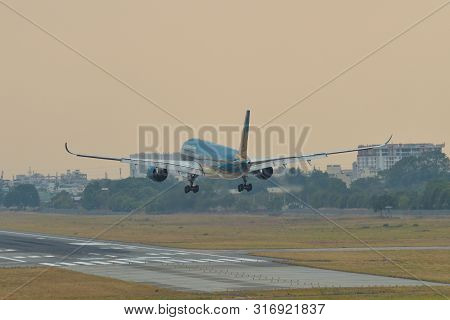 Passenger Airplane Landing At Saigon Airport