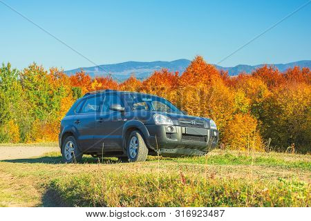 Mizhhirya, Ukraine - Oct 14, 2018: Hyundai Tucson Suv On The Gravel Country Road Side In Mountains. 