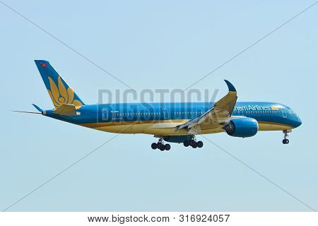 Passenger Airplane Landing At Saigon Airport