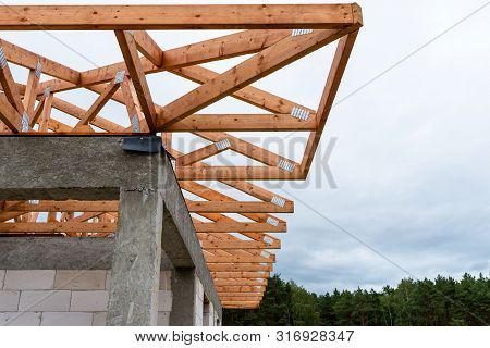 Roof Trusses Not Covered With Ceramic Tile On A Detached House Under Construction, Visible Roof Elem