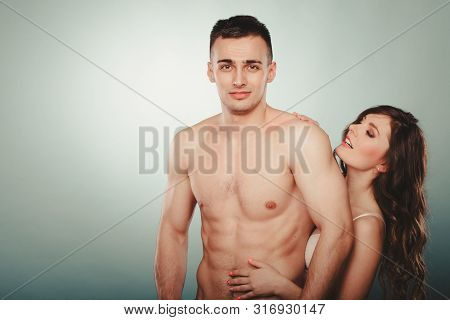 Sexy Passionate Young Couple Lovers Embracing In Studio. Handsome Muscled Half Naked Semi Nude Man A