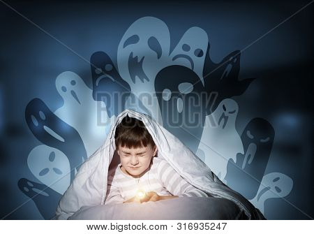Scared Boy Hiding Under Blanket From Imaginary Spooky Monsters. Fearful Kid With Closed Eyes Lying I