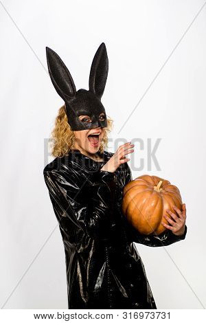 Cheerful Girl In Black Halloween Costume. Halloween Bunny Costume. Smiling Young Woman In Bunny Mask