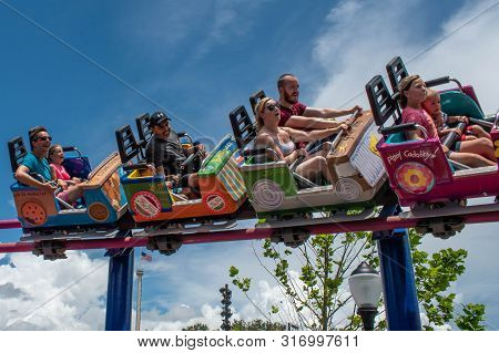 Orlando, Florida. August 07, 2019. People Enjoying Super Grovers Box Car Derby. It Is A Family Frien