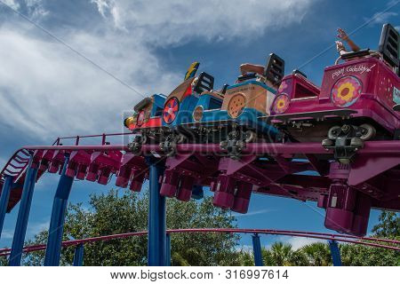 Orlando, Florida. August 07, 2019. People Enjoying Super Grovers Box Car Derby. It Is A Family Frien