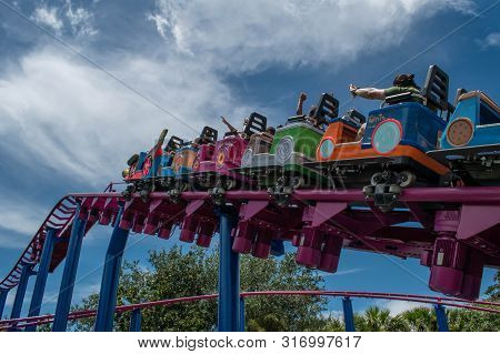 Orlando, Florida. August 07, 2019. People Enjoying Super Grovers Box Car Derby. It Is A Family Frien