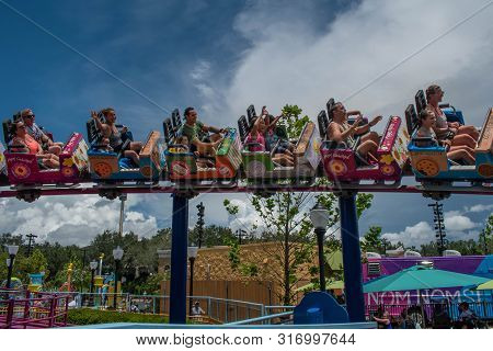 Orlando, Florida. August 07, 2019. People Enjoying Super Grovers Box Car Derby. It Is A Family Frien