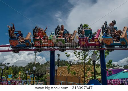 Orlando, Florida. August 07, 2019. People Enjoying Super Grovers Box Car Derby. It Is A Family Frien