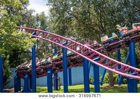 Orlando, Florida. August 07, 2019. People Enjoying Super Grovers Box Car Derby. It Is A Family Frien