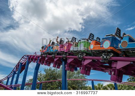 Orlando, Florida. August 07, 2019. People Enjoying Super Grovers Box Car Derby. It Is A Family Frien