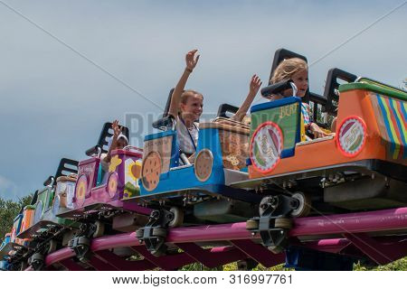 Orlando, Florida. August 07, 2019. People Enjoying Super Grovers Box Car Derby. It Is A Family Frien