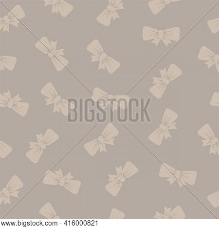 Seamless Pattern With Bows On A Beige Background