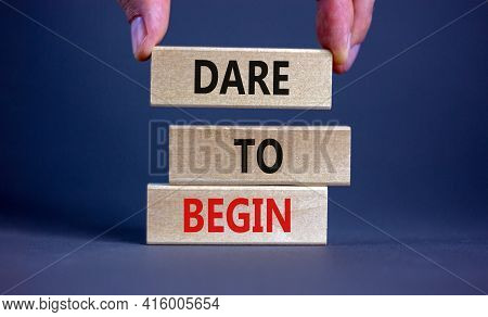 Dare To Begin Symbol. Wooden Blocks With Words 'dare To Begin'. Beautiful Grey Background, Businessm