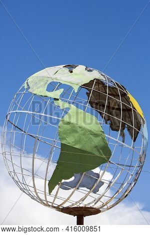 Tupiza, Bolivia - 28/12/2014: Metal Sculptured Globe Of The Planet Earth With Highlight On South Ame