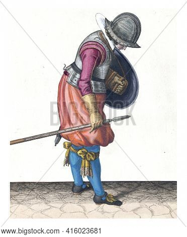The exercise with shield and spear: the soldier puts the spear next to his right foot on the ground, vintage engraving.