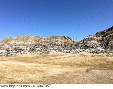 Beautiful Vistas Of A Golf Course In The Badlands Surrounded By Canyons, Hoodoos, Coulees And Mounta