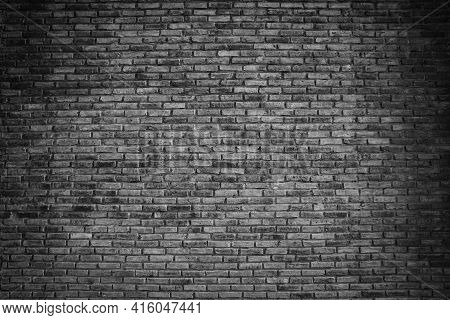 Black Brick Wall Background. Dark Stone Texture.