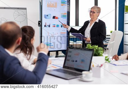 Experienced Senior Woman Ceo Cto Of Start Up Company Sharing Financial Reports