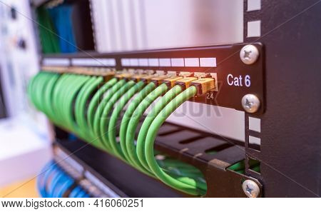 network cable connecting on network core switch close up