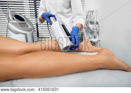 Endospheres Therapy. Woman Gets Endospheres Therapy And Massage For Legs. Anti-cellulite Massage
