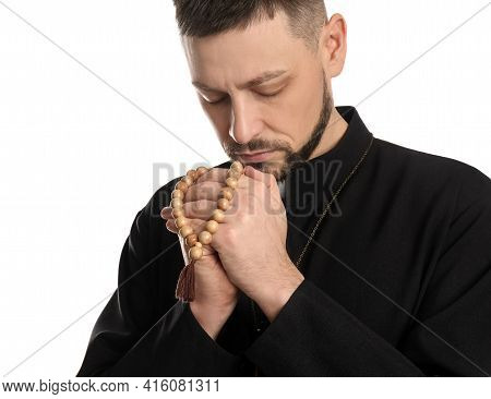 Priest With Beads Praying On White Background