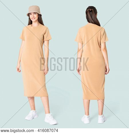 Woman in beige t-shirt dress and bucket hat casual wear apparel