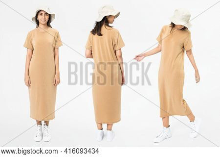 Woman in beige t-shirt dress and bucket hat casual wear apparel