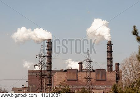 Environmental Pollution. Smoke From The Pipes Of A Mining Plant.