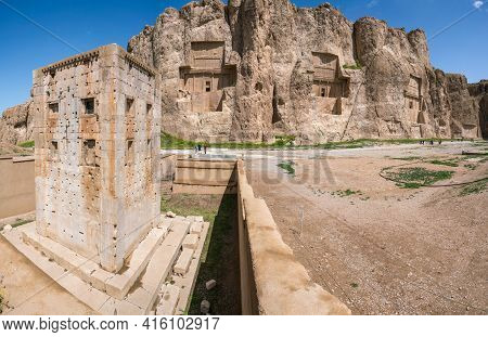 Sandstone Rock With Carved Tombs Of Persian Kings In Necropolis, Iran. King Burial Site Of Ancient P