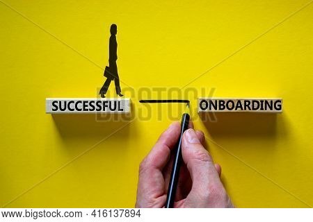 Successful Onboarding Symbol. Wooden Blocks With Words 'successful Onboarding'. Businessman Hand. Bu