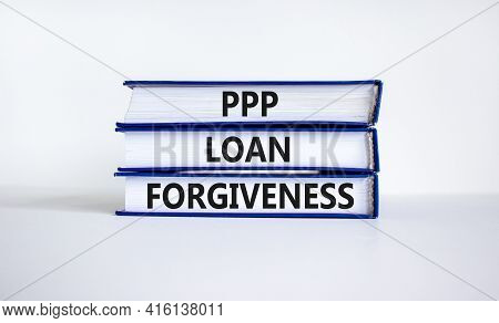 Ppp, Paycheck Protection Program Loan Forgiveness. Concept Words Ppp Loan Forgiveness On Books On Wh