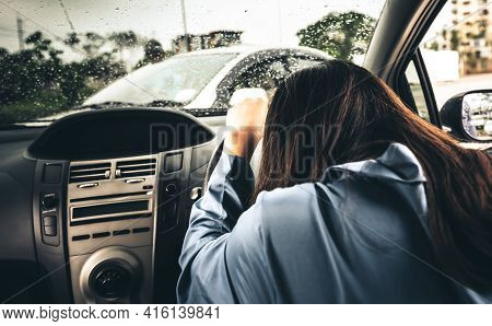 A Woman Driving And Having A Accident Car Crash, While Raining And Recklessness, To People And Trans