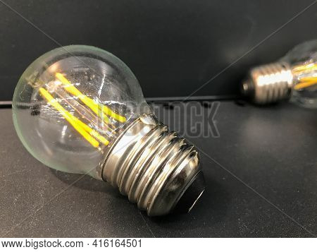 Glass Lamp, Electrician For The Apartment. Incandescent Light Bulb For Light In The House. Bright Ch