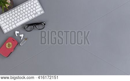 Mobile Wirless Work Desktop With Smartphone, Bitcoin, Computer Keyboard, Thumb Drive, Baby Plant And
