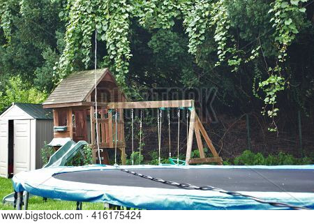 Dangerous Live Downed Power Line Draped Across Trampoline And Backyard Playground