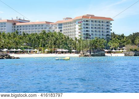 CEBU, PHILIPPINES - APRIL 5, 2016: Shangri La Mactan Resort and Spa from the water. The luxury resort features a Marine Sanctuary.