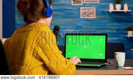 Influencer Answering At Messages Working With Green Screen Laptop