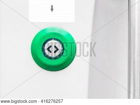 Button Opening The Door Of A Modern Electric Train Stadler, Close Up.