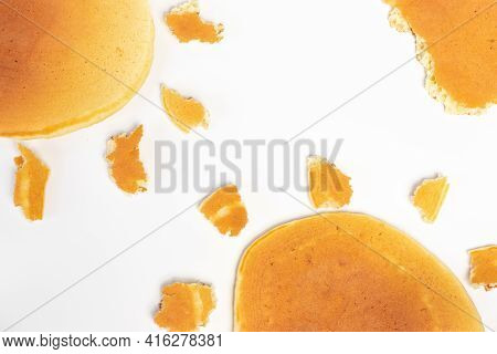 Pancakes On A White Background, In The Shape Of The Sun, On A White Background, Top View, With A Pla