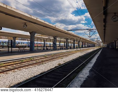 Thessaloniki, Greece - April 09 2021: Greek Train Wagons Operated By Ose Stopped At A Train Station.