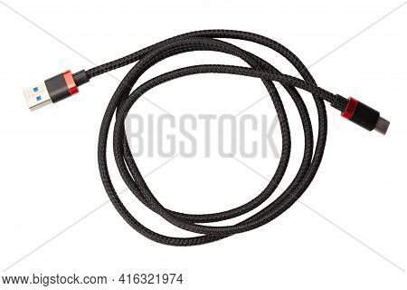 Black Usb Type C Charger Cable, Compatible For Many Devices, Wrapped In A Spiral Shape, Isolated On 