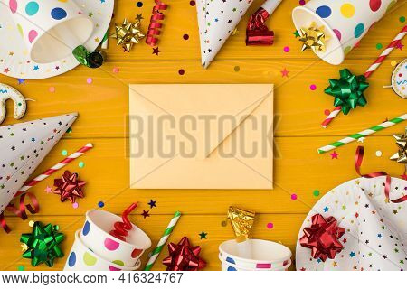Above Photo Of Yellow Envelope Cups Confetti Candles Plates Bow Party Whistle Tubules And Birthday H