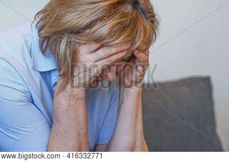 Elderly Woman Depression Or Domestic Violence. Domestic Violence Concept. Coseup Of Unhappy Female F