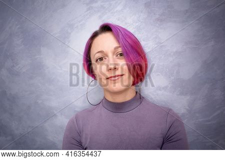 Adult Woman Portrait With Multicolored Hair On Wall Background. Creative Short Asymmetrical Haircut,
