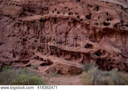 Erosion Holes Look Like Bird Houses On Cliffs In Capitol Reef National Park