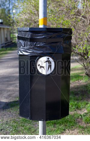 Close Up Of A Bin Specifically Used For Disposing Of Dog Waste Conceptualising. Dog Poo Waste Litter