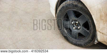 Close-up Of Metal Rim Of Car Wheel. Detail Of Car With A Lot Of Copyspace On Background