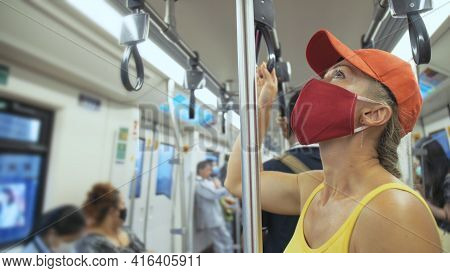 Woman Travel Caucasian Ride At Overground Train Airtrain With Wearing Protective Medical Mask. Girl 