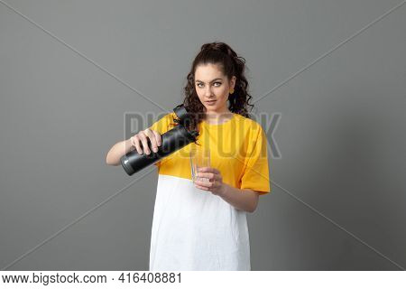 Teenager Holding Eco Reusable Smart Thermo Water Bottle With Drink Reminder, Health Care Concept