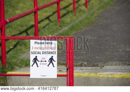 Social Distancing Sign At School Playground Road Crossing
